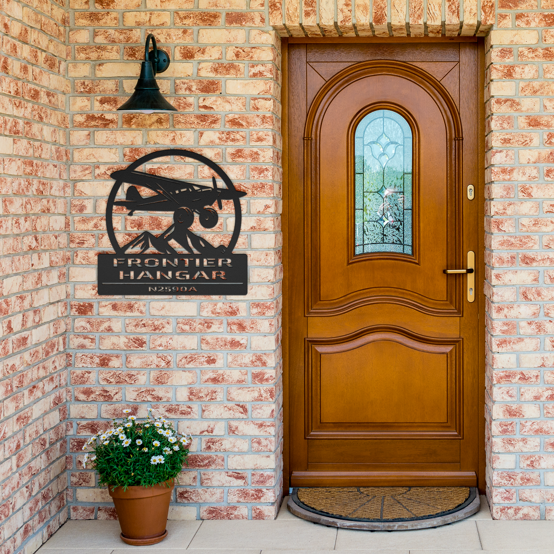 Super_Cub_Big_Wheels_Frontier_Hangar_Black_Brick_Entrance_Mockup.png_15843858